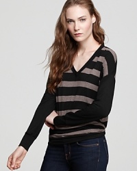 A cozy, comfortable shape for all seasons, this clean striped top pairs perfectly with skinny jeans or cords.