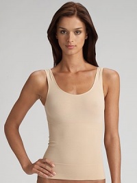 Sleek and seamless shapewear tank in an elasticized knit that instantly smooths and slims your torso. Control fabric helps smooth and slim Pull-on style Nylon/elastene/cotton Hand wash Imported