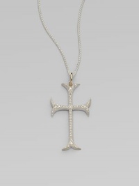 A graceful French Gothic cross sparkles with the dazzle of diamonds set in sterling silver on a woven silver chain with gold accents.Diamonds, .60 tcwSterling silver and 14k yellow goldChain length, about 18Pendant length, about 1½Spring ring claspMade in USA