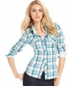 Inspired by the boys, but this GUESS? shirt is tailored just for you. A bright plaid print and pearlized snap-button closures make this a stylish statement for any day of the week.