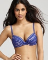 A lovely lace overlay lends feminine flair to this underwire plunge bra from Pleasure State. Style #P22-2209W