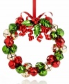 It has a ring to it. A wreath crafted of red, green and gold jingle bells elevates your tree with irresistible merriment.