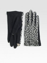 Ultra-soft, ultra-toasty wool and angora blend in a fashionable cheetah print with touch technology for easy access to touchscreen electronics.About 8 long60% wool/20% angora/20% nylonDry cleanImported