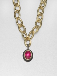 From the Laguna Collection. A pretty, faceted fuchsia quartz center set in 18k gold and sterling silver accented with three rows of rich black spinel. Fuchsia quartz18k goldSterling silverBlack spinelSize, about 1.33Black spinel accented baleImported Please note: Chain sold separately. 