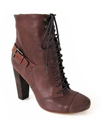 Rebel rebel: prim, laced-up style meets buckled-up moto edge in these Plenty by Tracy Reese booties.