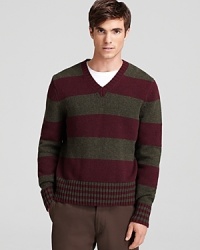 Bold stripes adorn this luxe wool v-neck sweater from Jack Spade.