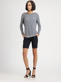 Fine stripes add just the right graphic touch to this soft and slouchy jersey pullover.BoatneckDropped shouldersChest pocketPullover styleAbout 25 from shoulder to hem94% rayon/6% nylonDry cleanImportedModel shown is 5'10 (177cm) wearing US size Small. 