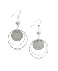 Let perfect rings frame your face. These shimmery orbital drop earrings by Style&co. feature a unique sandblasted design and beaded accents. Crafted in silver tone mixed metal. Approximate drop: 2-1/2 inches.