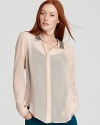 A sequin-embellished collar brings a touch of drama to this breezy, sheer blouse from Sanctuary.