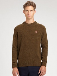 A classic crewneck pullover with a rich, textured finish lending a dapper effect to a casual pullover look.CrewneckRibbed knit collar, cuffs and hemLambswoolDry cleanImportedThis style runs true to size. We recommend ordering your usual size for a standard fit. 