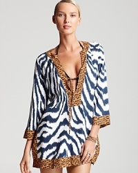 Stripes or spots? Have both exotic prints in one stylish swimsuit coverup with this ViX tunic, which will add sophisticated, get-noticed style to all your poolside favorites.