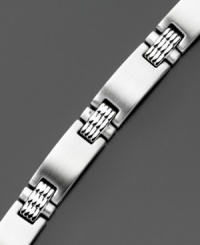 Stainless steel bracelet with ribbed detailing radiates a modern edge, perfect for every day. Length measures 8 inches.