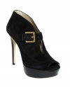 The sexy texture of MICHAEL Michael Kors' Eboni booties makes this style a glamourous one. A buckled strap crosses the open vamp for a Mary Jane-inspired look.