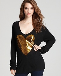 Boasting a lovable sequin heart and relaxed fit, it's hard not to be enchanted by this cozy WILDFOX sweater.