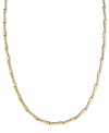 Golden and glamorous, this stylish X-patterned necklace dazzles with diamond accents. Crafted from 14k gold. Approximate length: 17 inches. Approximate width: 1/8 inch.