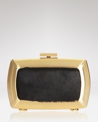 The party-perfect clutch from BCBGMAXAZRIA has a wild-child quality about it.