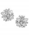 Special occasion sparkle for non-pierced ears. Carolee's subtly shimmering stud earrings feature an intricate pattern of glass accents set in silver tone mixed metal. Approximate diameter: 3/4 inch.