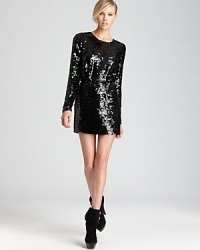 Standout in sequins with this shimmering Rachel Zoe dress with cutout back. Team with edgy booties for city chic.