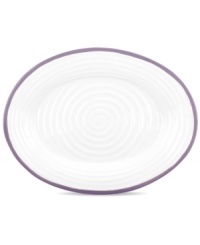 Distinctly ribbed Sophie Conran dinnerware sets your table with the charm of traditional hand-thrown pottery, but the durability of contemporary Portmeirion porcelain. Mix the banded Carnivale platter with solid mulberry pieces.