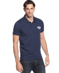 Stay versatile. Sporty can go anywhere when you're in this polo shirt from adidas.