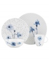 A fresh take on floral patterns, Watercolors Indigo Blue dinnerware from Lenox Simply Fine features painterly blossoms in shades of blue against lively geometric designs. Glossy bone china in crisp white adds sleek style and lasting durability to a collection of place settings that is irresistibly fun.