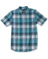 Stay bold. Make an everyday statement with this plaid shirt from DC Shoes.