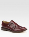 Double-buckle monk strap in bordeaux leather.LeatherLeather soleMade in Italy