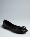 Basic ballet flats get a dose of glam with glitter uppers in this Tory Burch design. They're simply sparkling.