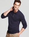 A sophisticated polo design in decadent cashmere expresses your taste for classic luxury.