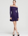 Show off your shoulders in this ponte knit Halston Heritage dress, exuding youthful appeal with a flared circle skirt.