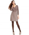 Subtle stripes create a chic style statement on this petite sweater dress from Spense -- perfect for work or play!