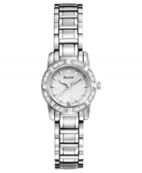 Classic elegance for the modern woman: the Dress collection watch from Bulova is adorned with diamond accents swirling around the dial.