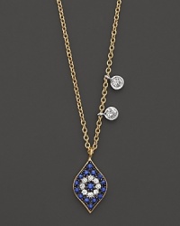 Diamonds and sapphires form a dazzling evil eye charm on a 14K yellow gold chain. By Meira T.