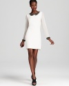 An embellished peter pan collar and cuffs lend sparkling luxury to a sweet, feminine dress from ABS by Allen Schwartz.