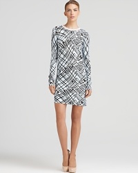 Slip into this printed DIANE von FURSTENBERG dress that flaunts a classic A-line silhouette that falls above the knee--a sweater dress for fall remains a timeless must-own look for all.