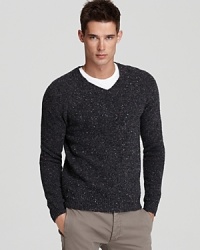 With a speckled knit and long sleeves, the versatile Malthus features a V-neck that works equally well with a crewneck tee or a collared dress shirt.