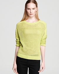 Infused with color, this Tibi sweater is full of flavor, courtesy of its open knit and dolman sleeve design.