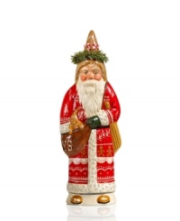 A piece you'll treasure for years to come. This unique figurine, shaped in a vintage mold and hand-painted, features Santa Claus with rosy cheeks, a traditional robe and a happy friend for a look of holiday splendor. From Vaillancourt.