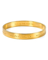 Statement-chic: this kate spade new york bangle is dressed up in encouraging engravings. Resolve to wear it year round.