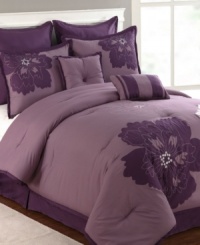 Modern romance blooms. Passionate purple sets the scene in this Fatima comforter set, featuring bold applique flowers in tonal hues. Comes complete with shams, bedskirt and decorative pillows for a look that's simple yet totally chic.