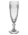 Regal shaping blends with romantic accents in this storybook stemware pattern from Villeroy & Boch. Ornate cut crystal stems support fluted bowls crowned by a fern leaf band.