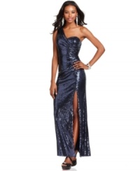 Go for all-out glam in this sparkling gown from Xscape, sequined from top to bottom and featuring a flirty one-shoulder silhouette.