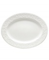 An elegant white-on-white dinnerware pattern featuring an embossed vine motif and interior glaze, the Opal Innocence Carved collection of dinnerware and dishes gets your table set for refined dining every day.