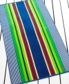 Preppy, multi-colored stripes offer a polished look in this Pacific Stripe beach towel from Lauren Ralph Lauren. Features the Ralph Lauren logo in the corner.