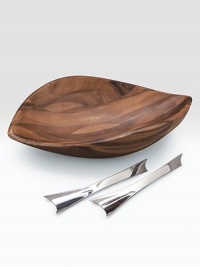 An artisan bowl is handcrafted of dense, durable acacia with a finely patterned grain and modern, sloping lines. Unique servers made of stainless steel define this beautiful serving set. 19W X 5H X 12½D Hand wash Imported