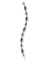 Ever-glamorous pavé crystals frame stunning sapphire stones on this modern Lora Paolo bracelet.