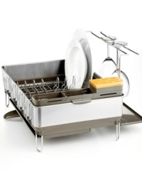 You dish it out, this rack can take it! Designed with a mess-free swivel spout, this steel essential drains water directly into the sink and features an extendable drip tray that catches drips underneath the integrated cup holders. An oversized utensil holder, natural bamboo knife block and removable wine glass holder make it easy to leave the dishes-all of them-out to dry!