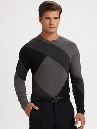 A bold, graphic pattern enhances this casual classic, shaped in fine wool.Crewneck95% viscose/5% elastaneDry cleanImported