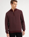 A sporty pullover with a sophisticated mockneck collar in a fine, textured diagonal knit.Ribbed mockneck collarHalf-zip frontLong sleeves with ribbed cuffsRibbed hemMerino woolDry cleanImported