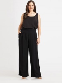 A phenomenal pant with a chic, high-waist design and well-placed pleats for high-fashion appeal. High-waist designPleated frontSide zipperBack waist dartsInseam, about 3255% viscose/45% acetateDry cleanImported of Italian fabric